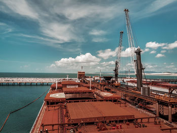 Golden gate bridge over sea against sky