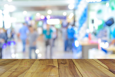 Defocused lights on hardwood floor