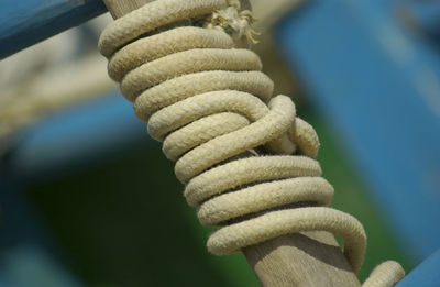 Close-up of rope tied to metal
