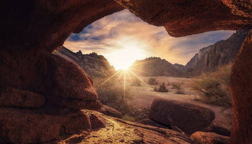 View of rock formation against sky during sunset