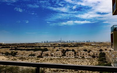 Buildings in city against sky