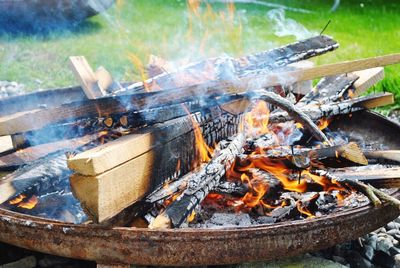 High angle view of meat on barbecue grill