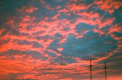 Low angle view of dramatic sky during sunset