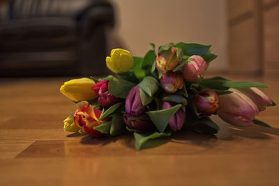 Close-up of flower vase on floor