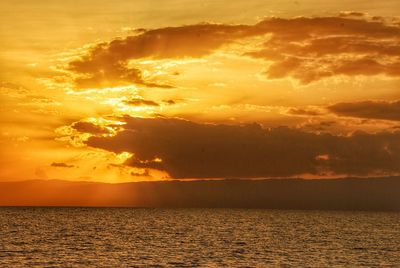 Scenic view of sea at sunset