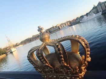 Close-up of ship in sea against clear sky