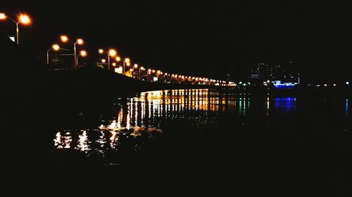 Illuminated street light at night