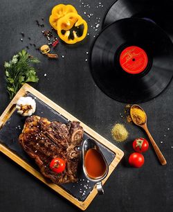 High angle view of fruits in plate on table