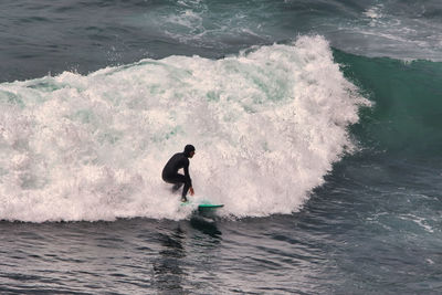 Man surfing in sea