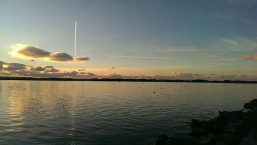 Scenic view of sea at sunset