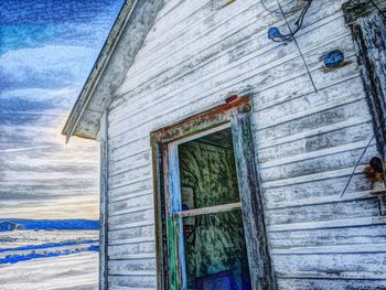 Wooden structure against blue sky