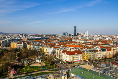 High angle view of illuminated buildings against sky