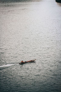 Man on boat in sea