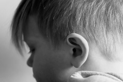 Close-up of boy looking away