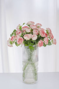 Flowers in vase on table