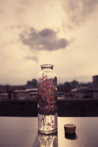 Close-up of glass of jar on table