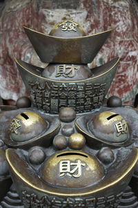 Close-up of gold colored bowl