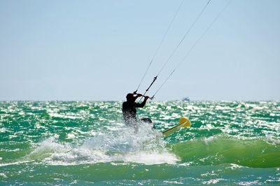 Sailboat sailing in sea