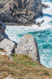 Scenic view of rocks in sea