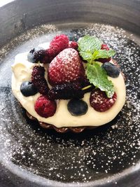 High angle view of strawberries in plate