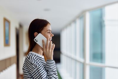 Young woman using mobile phone