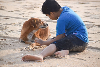 Full length of boy on beach