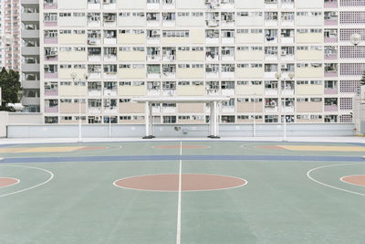 High angle view of empty court by buildings