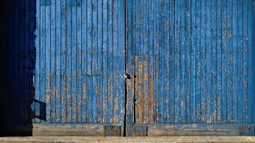 Full frame shot of closed wood blue door