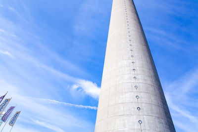 Low angle view of building against cloudy sky