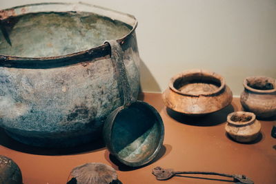 Close-up of old objects on table