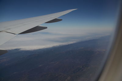 Aerial view of mountains against sky