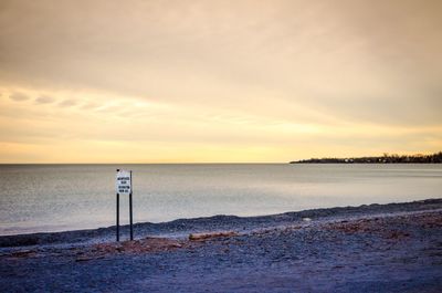 Scenic view of sea at sunset