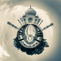 Low angle view of clock tower against sky