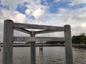 Bridge over river against sky