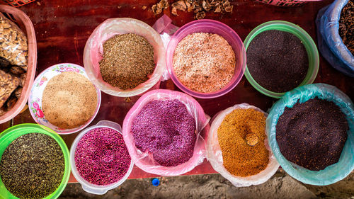 High angle view of multi colored food at market stall for sale