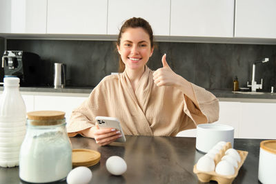 Young woman using mobile phone