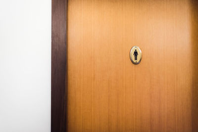 Close-up of light painting on wooden door