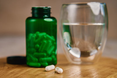 Close-up of pills in bottles
