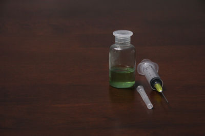 High angle view of empty bottles on table