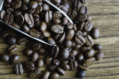 Close-up of coffee beans on table