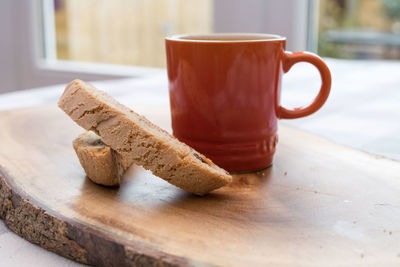 Close-up of biscotti and coffee on table