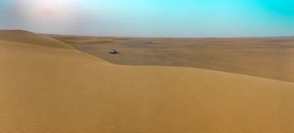 Scenic view of desert against sky