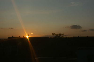 Scenic view of silhouette landscape against sky during sunset