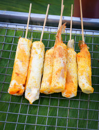 Close-up of meat on barbecue grill