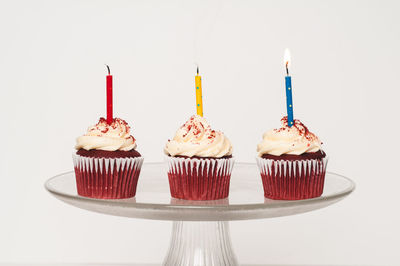 Close-up of cupcakes against white background
