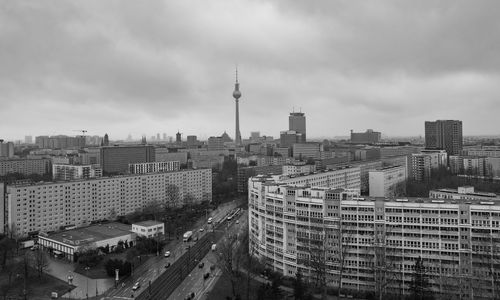 High angle view of city against cloudy sky