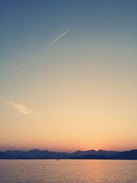 Scenic view of sea at sunset
