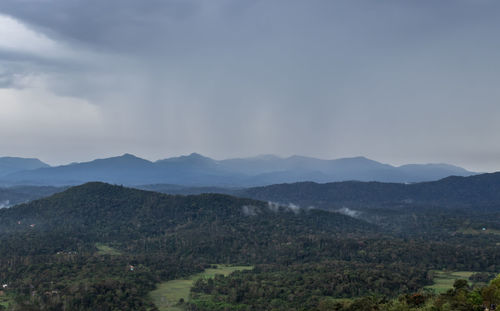 Mountain horizon with dramatic sky at morning from flat angle