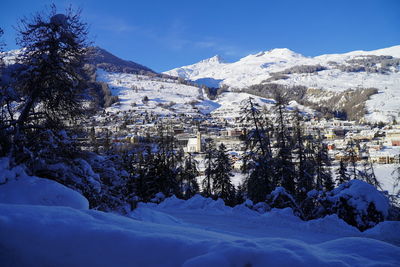 Snow covered mountains against sky