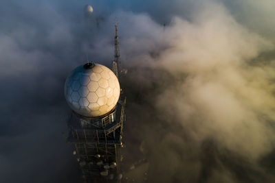 Aerial view building amidst cloud